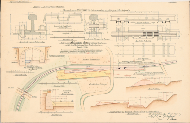 Altes Buch mit detaillierten Zeichnungen und Text eines Eisenbahnlayouts, das eine Zuggleis-Illustration auf dem Cover zeigt.