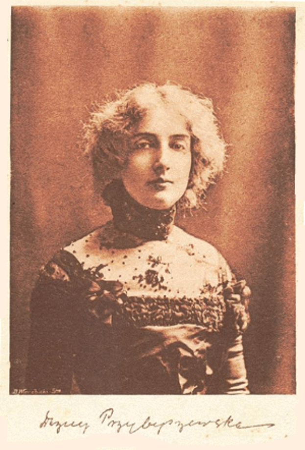 Ein altes Foto einer Frau mit lockigen Haaren in einem Kleid, mit dem Text "Foto der Kaiserin" unten.