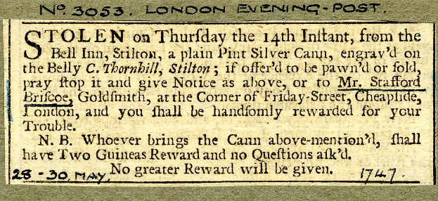 Schwarze und weiße Postkarte mit einem Mannsgesicht und Text über einen gestohlenen Silber-Pint-Becher.