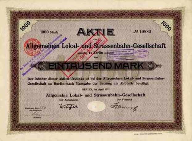 Ein altes deutsches Wertpapierzertifikat, das von der deutschen Regierung ausgestellt wurde und Text und Zahlen enthält.