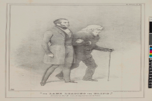 Zwei Männer stehen nebeneinander auf einem Papier mit Text und Farbskalen, einer hält einen Stock, mit dem Text "Der Weg des Blinden" auf dem Papier.