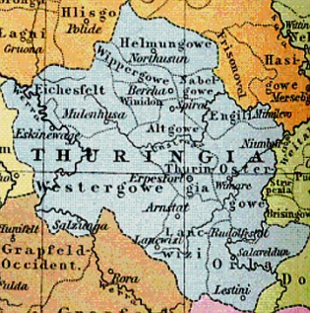 Eine detaillierte Karte der Stadt Thüringen, die Straßen, Gebäude und Sehenswürdigkeiten zeigt, mit Text, der den Standort der Stadt angibt, primarily in shades of blue, green, and yellow.