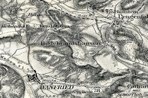 Ein detailliertes altes Stadtplan von Wannfried, Deutschland, das Straßen, Gebäude und andere Merkmale mit Textanmerkungen zeigt.