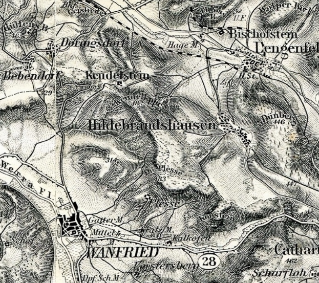 Ein detailliertes altes Stadtplan von Wannfried, Deutschland, das Straßen, Gebäude und andere Merkmale mit Textanmerkungen zeigt.